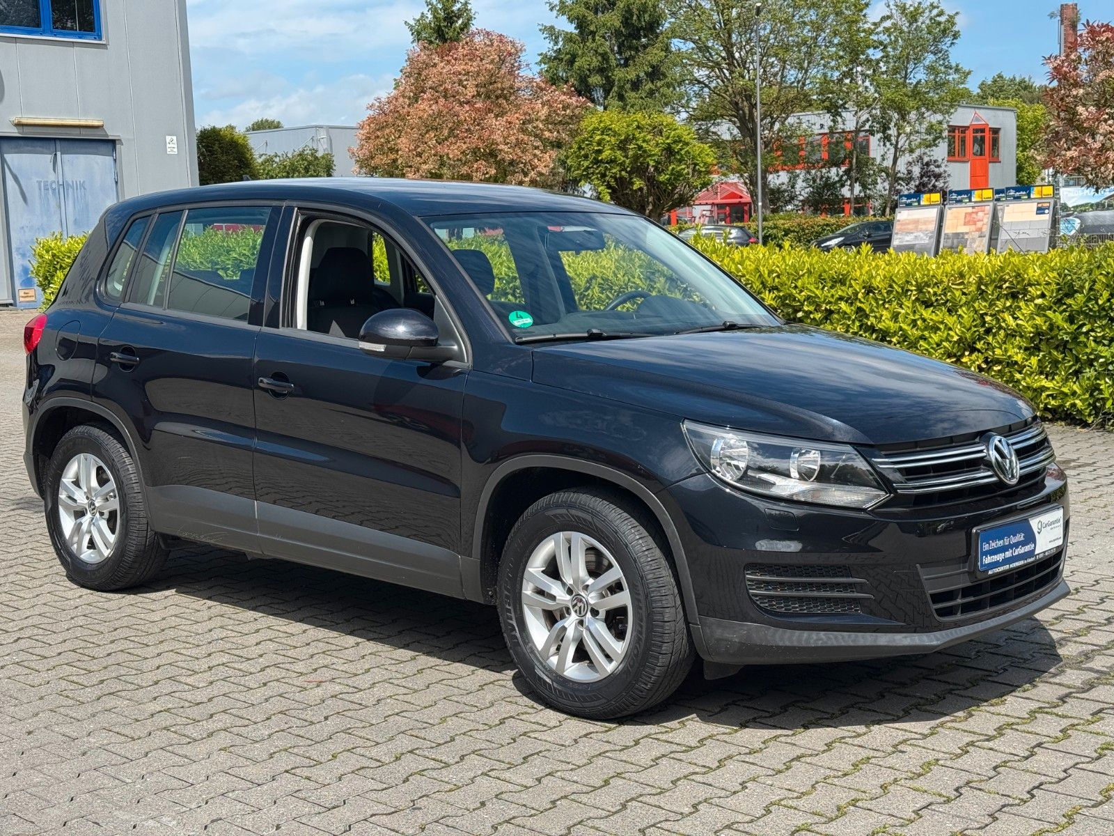 Volkswagen Tiguan 2014, 89 571 км, 90 kW (122 PS) бензин, schaltgetriebe — фото с аукциона, доставка в Беларусь