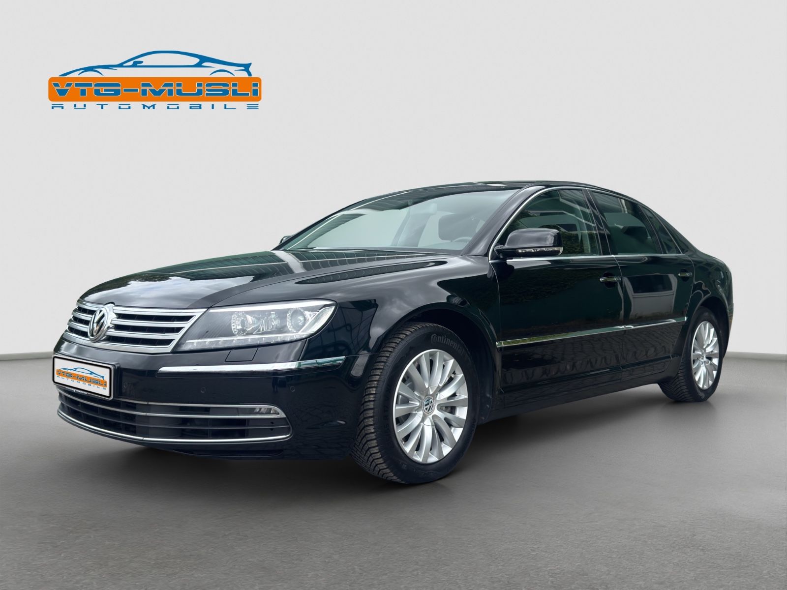 Volkswagen Phaeton 2014, 126 335 км, 180 kW (245 PS) дизель, автомат — фото с аукциона, доставка в Беларусь