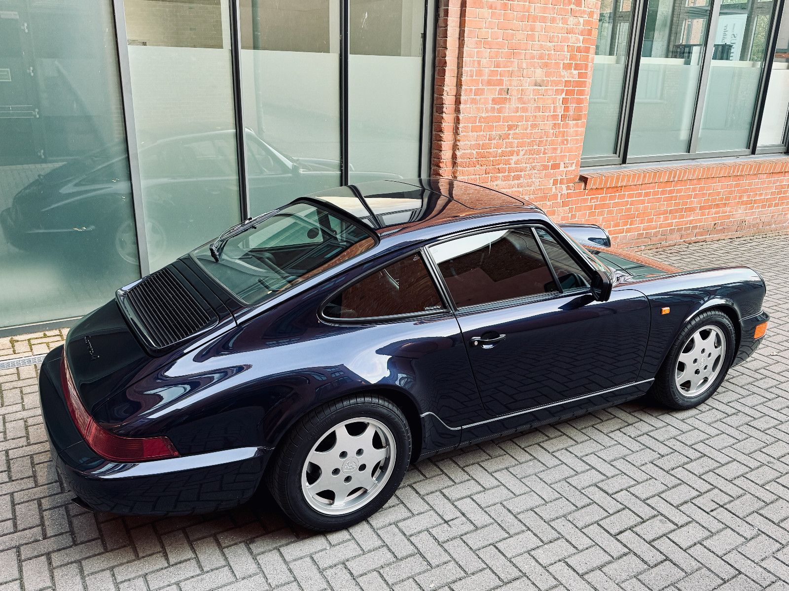 Porsche 964 1990, 85 000 км, 184 kW (250 PS) бензин, schaltgetriebe — фото с аукциона, доставка в Беларусь