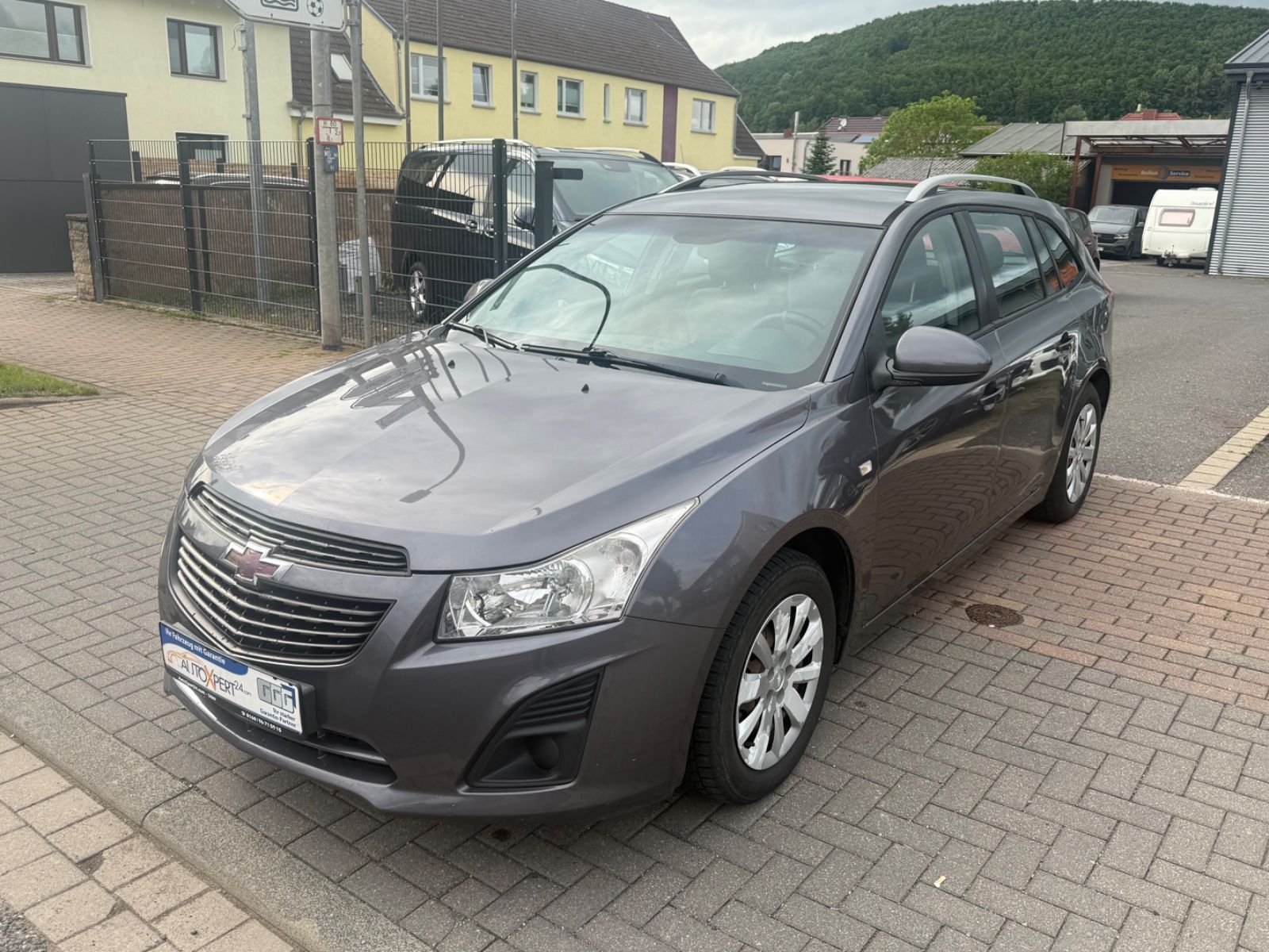 Chevrolet Cruze 2013, 161 000 км, 91 kW (124 PS) бензин, schaltgetriebe — фото с аукциона, доставка в Беларусь