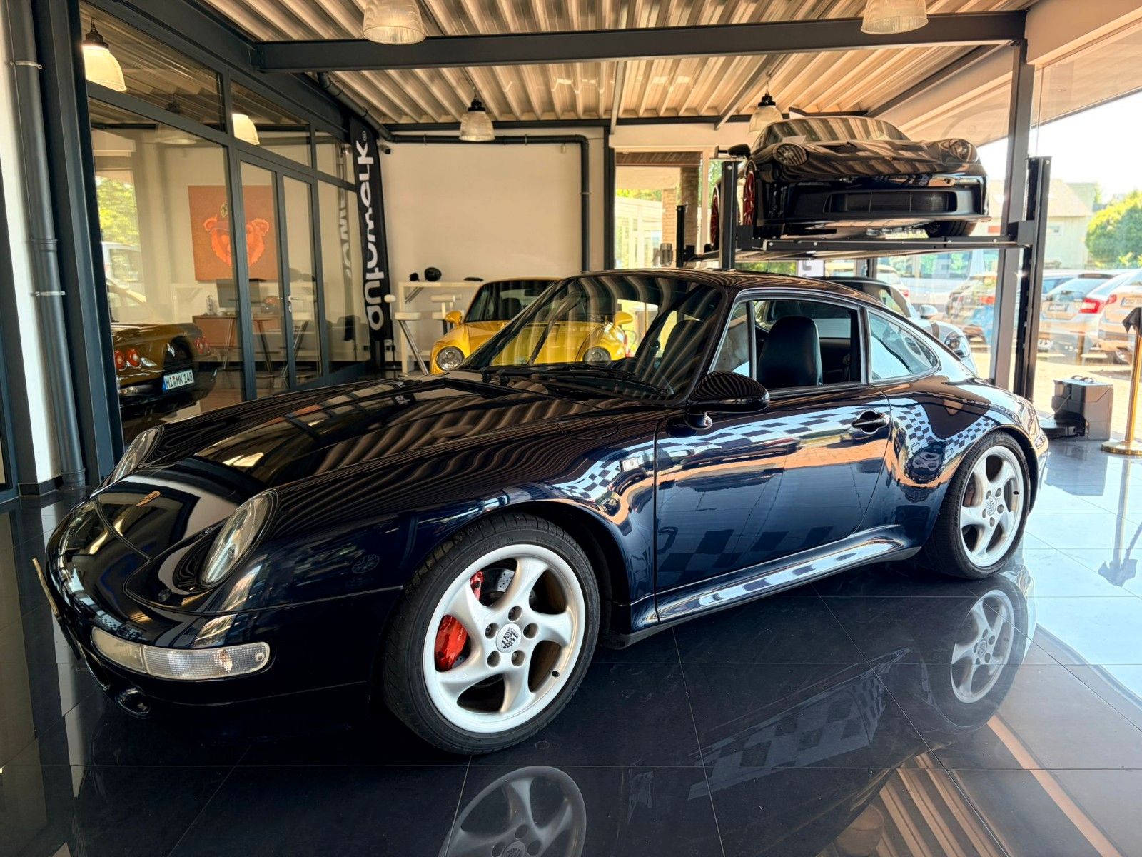 Porsche 993 1996, 117 500 км, 210 kW (286 PS) бензин, schaltgetriebe — фото с аукциона, доставка в Беларусь