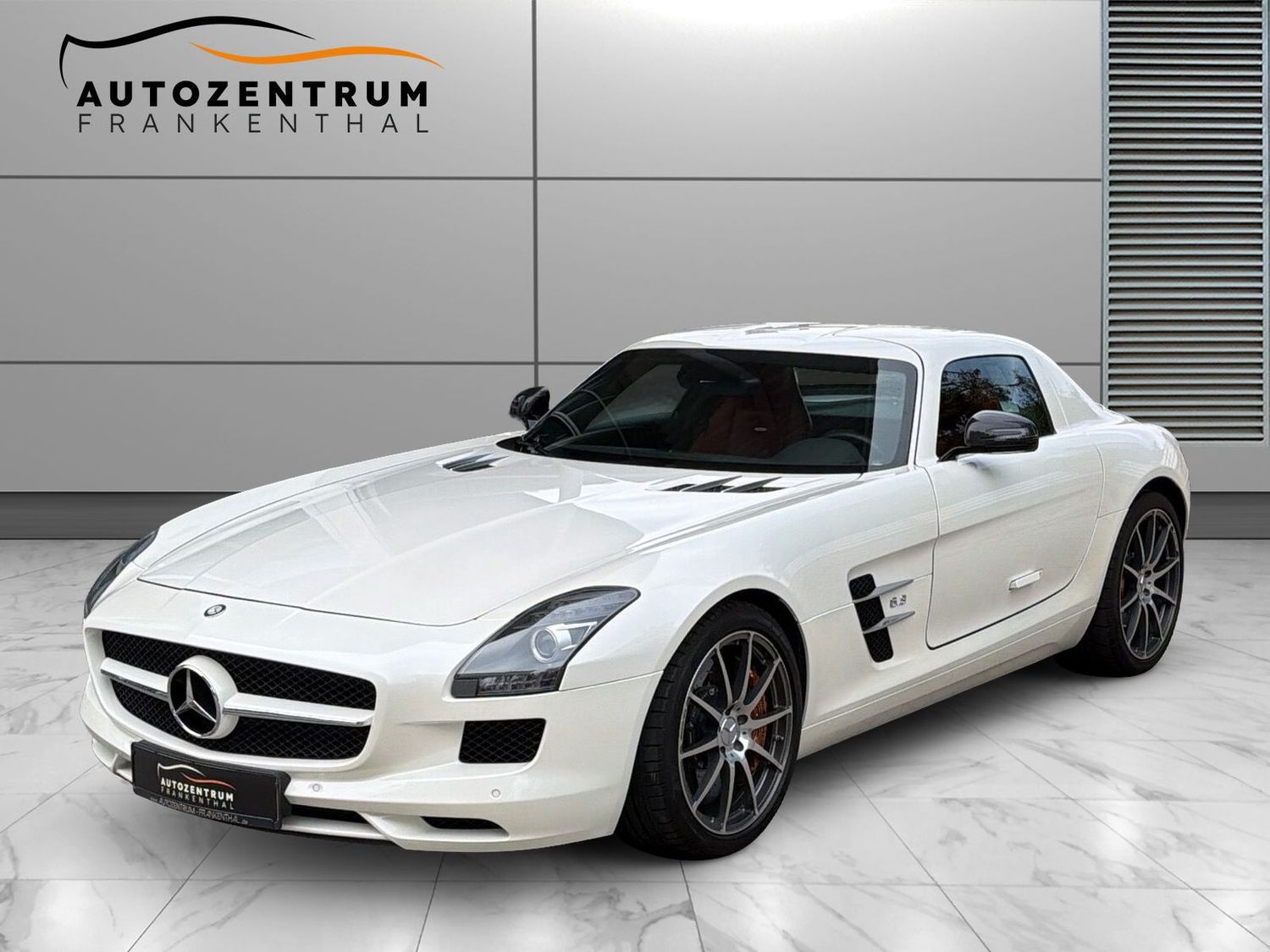 Mercedes-Benz SLS AMG 2010, 52 800 км, 420 kW (571 PS) бензин, автомат — фото с аукциона, доставка в Беларусь