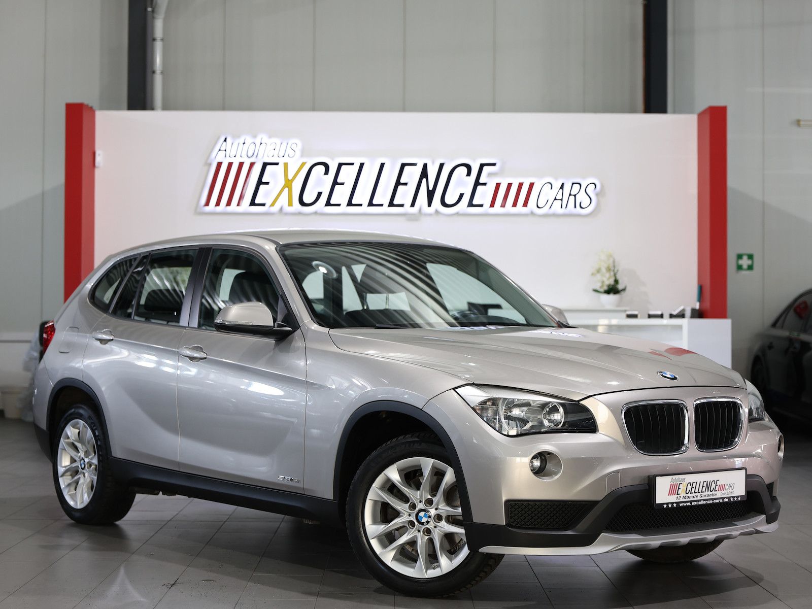 BMW X1 2014, 97 000 км, 110 kW (150 PS) бензин, schaltgetriebe — фото с аукциона, доставка в Беларусь