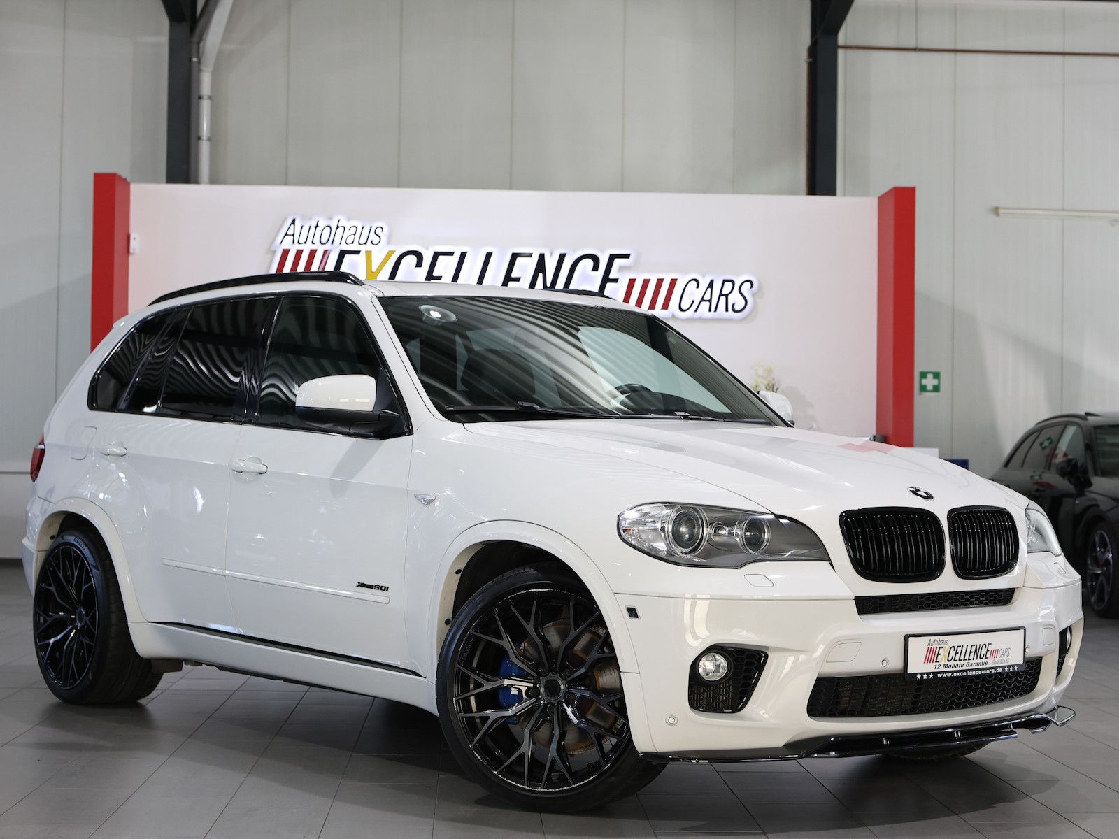 BMW X5 2012, 66 000 км, 300 kW (408 PS) бензин, автомат — фото с аукциона, доставка в Беларусь