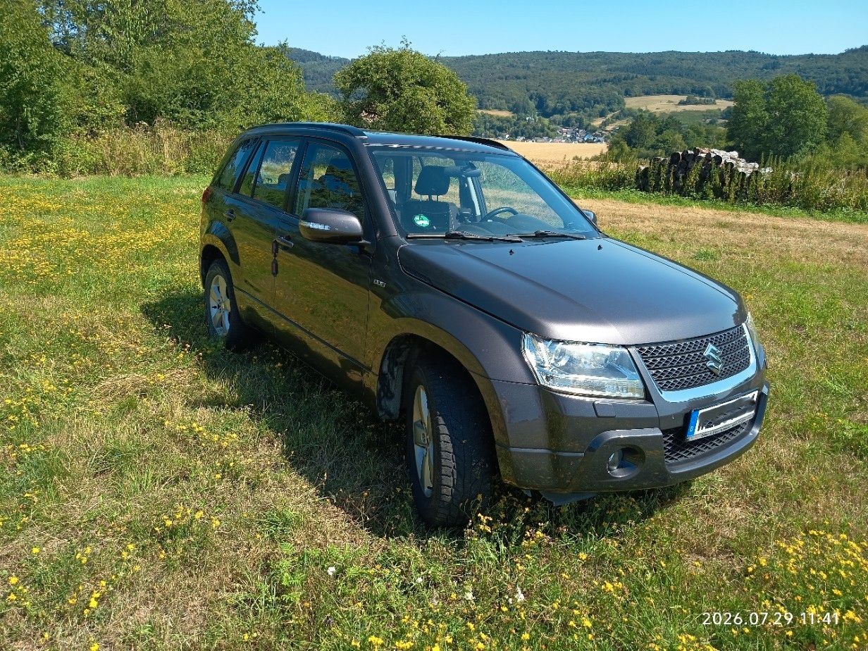 Suzuki Grand Vitara 2012, 165 000 км, 95 kW (129 PS) дизель, schaltgetriebe — фото с аукциона, доставка в Беларусь