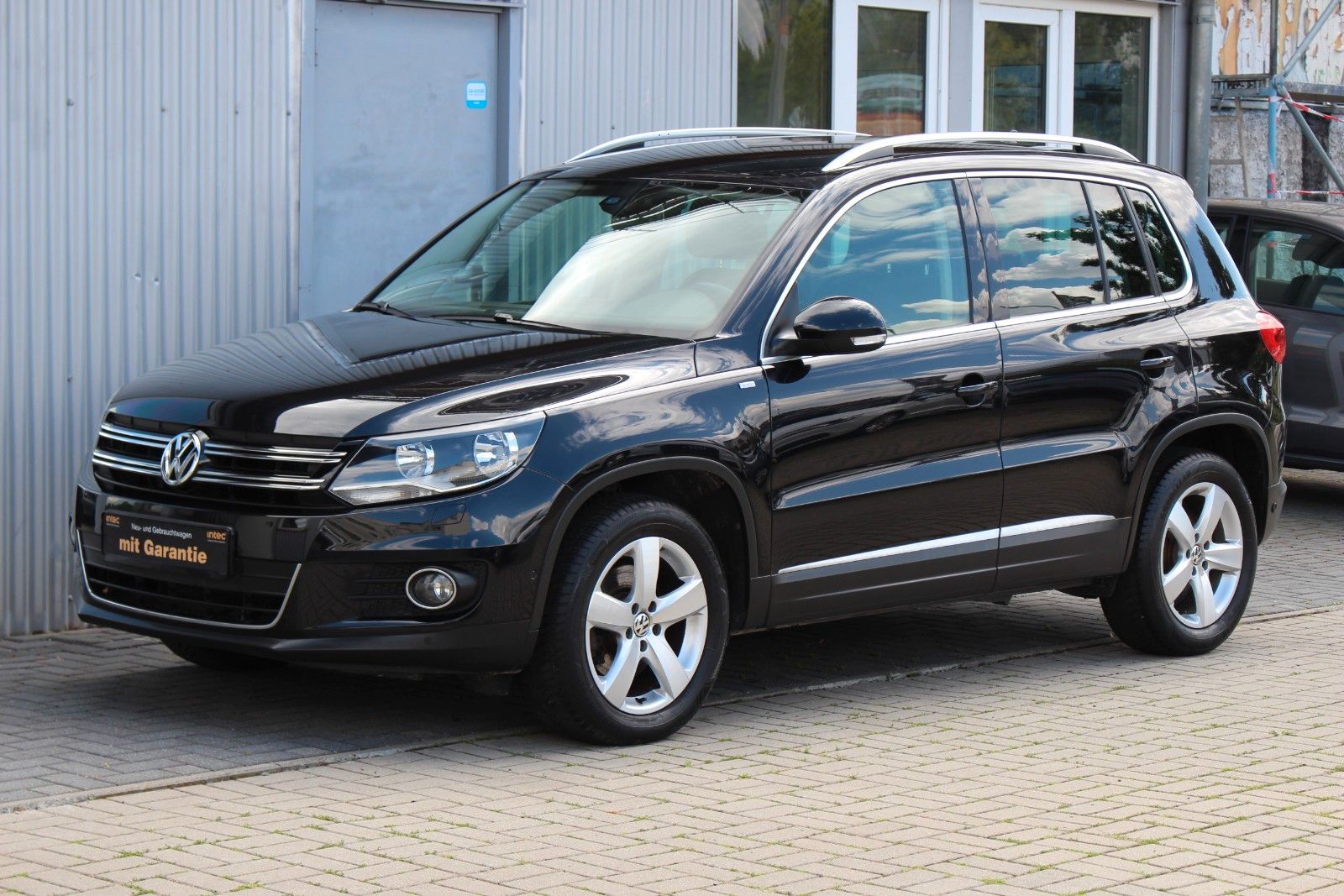Volkswagen Tiguan 2014, 96 798 км, 90 kW (122 PS) бензин, schaltgetriebe — фото с аукциона, доставка в Беларусь