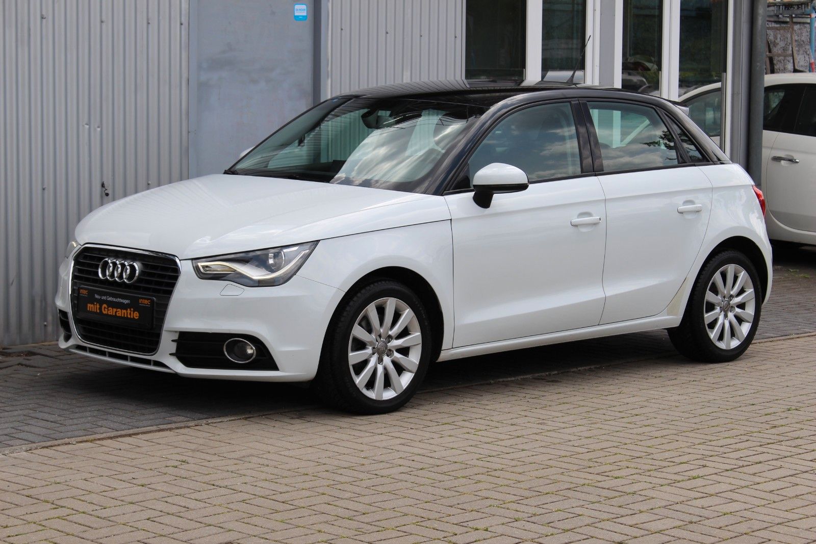 Audi A1 2014, 92 266 км, 90 kW (122 PS) бензин, автомат — фото с аукциона, доставка в Беларусь